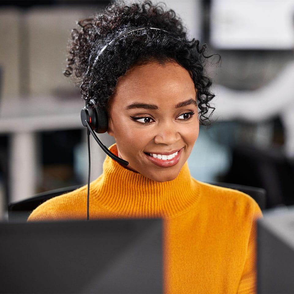Person using Jabra Engage 50 II headset in a office