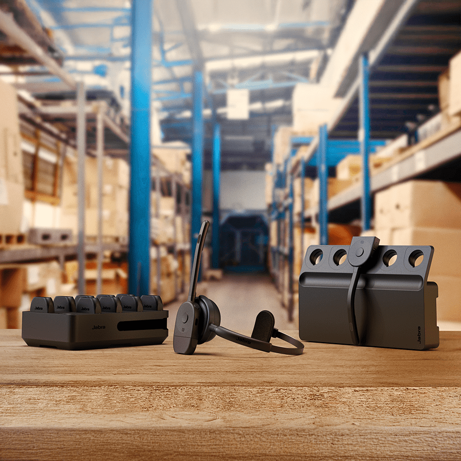 Jabra Perform 75 with accessories on a table in a warehouse