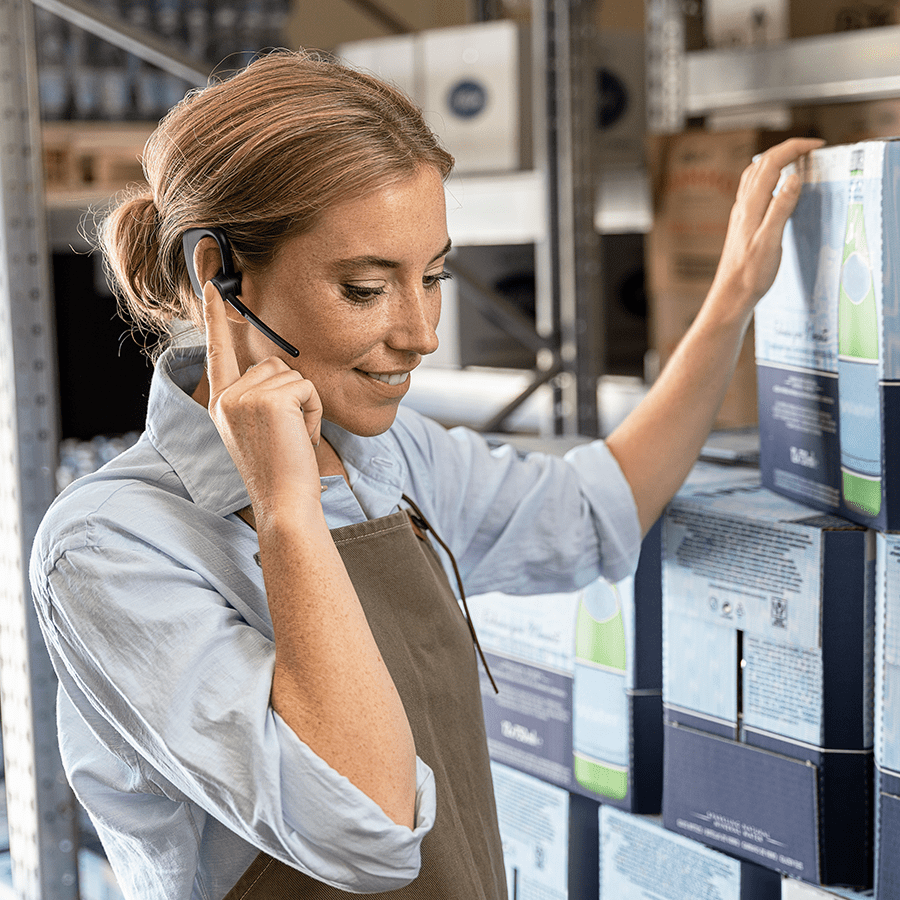 Female worker wearing Jabra perform 45 headset